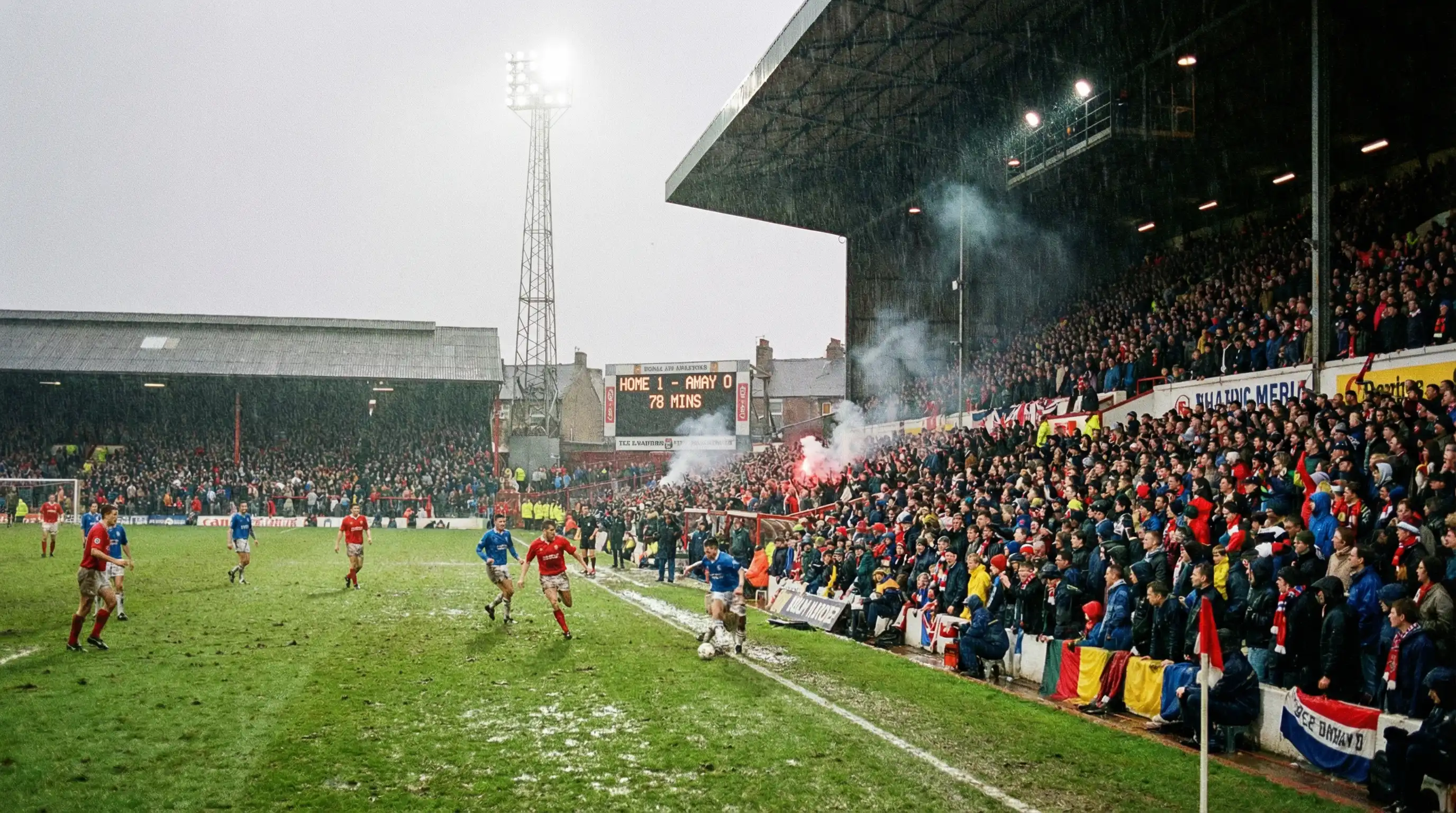 Scommesse calcio Premier League: stadio inglese pieno di tifosi durante una partita